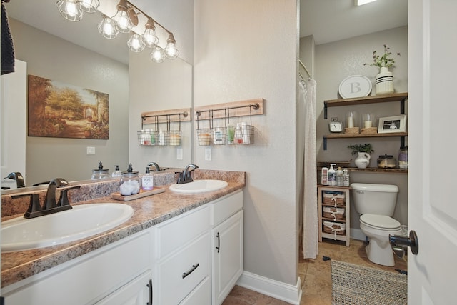 full bathroom featuring a sink, a shower with curtain, toilet, and double vanity