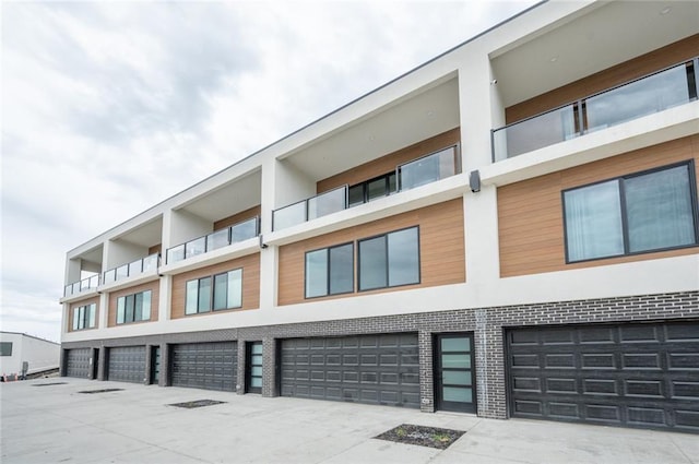 508 Indianola Rd Unit 1, Des Moines, IA 50315 - view of building exterior with a garage