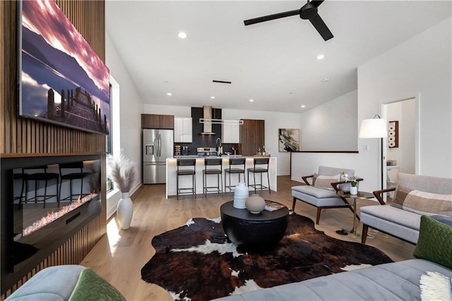 508 Indianola Rd Unit 1, Des Moines, IA 50315 - living room featuring light wood-type flooring, recessed lighting, and ceiling fan