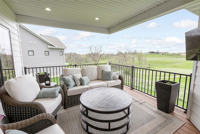 wooden deck with outdoor lounge area
