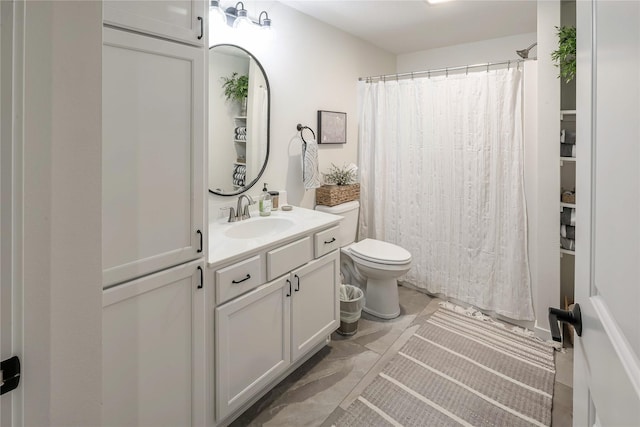 bathroom with vanity, a shower with curtain, and toilet