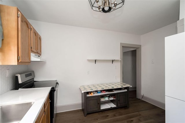 kitchen featuring open shelves, under cabinet range hood, dark wood finished floors, a notable chandelier, and stainless steel range with electric cooktop