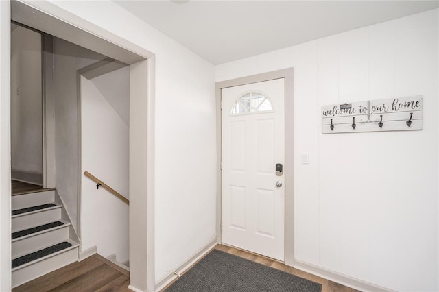 entrance foyer with dark wood-style flooring