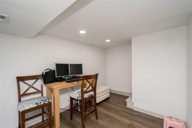 office space with recessed lighting, baseboards, visible vents, and wood finished floors