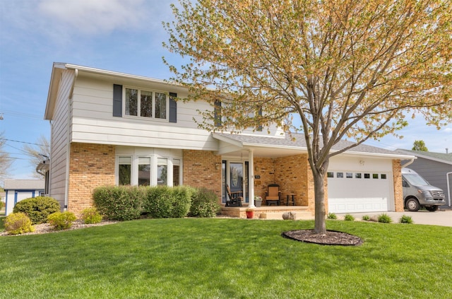 traditional home with concrete driveway, a front lawn, and brick siding
