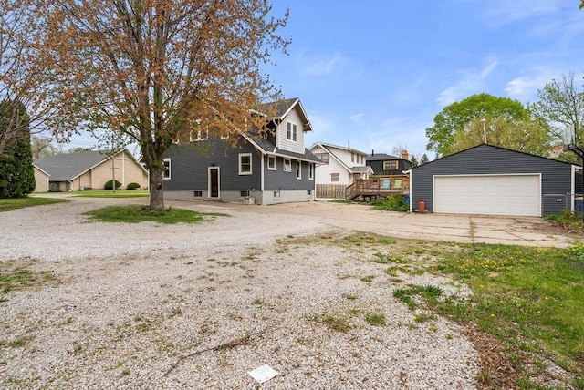 4714 Douglas Ave, Des Moines, IA 50310 - view of front of home with a garage and an outdoor structure