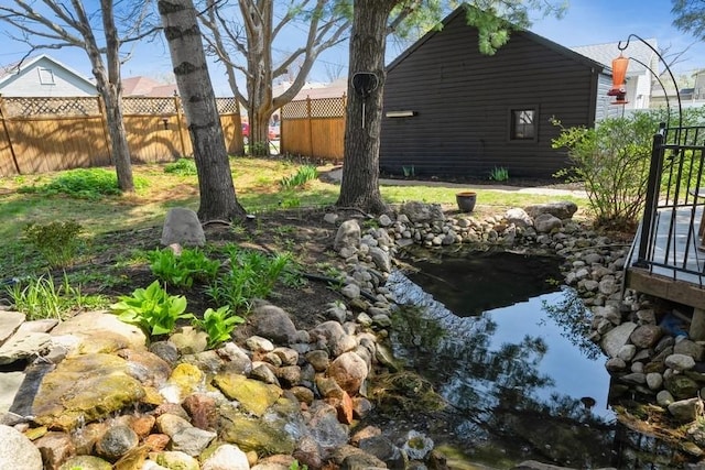 view of yard featuring fence