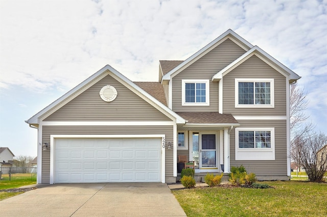 520 SE Murphy Dr, Waukee, IA 50263 - traditional-style home featuring fence, roof with shingles, a front lawn, a garage, and driveway