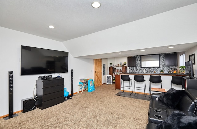 520 SE Murphy Dr, Waukee, IA 50263 - living area with carpet floors, bar area, baseboards, and recessed lighting