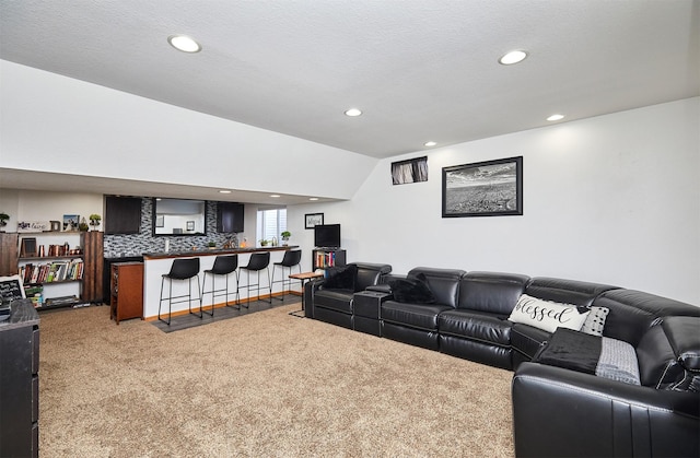520 SE Murphy Dr, Waukee, IA 50263 - carpeted living room with indoor wet bar, recessed lighting, and lofted ceiling