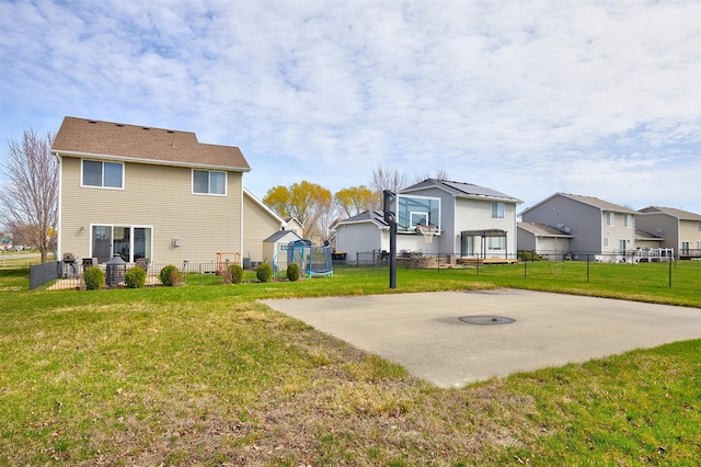 520 SE Murphy Dr, Waukee, IA 50263 - rear view of house featuring a lawn, a residential view, and a fenced backyard