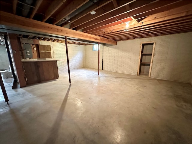 unfinished below grade area with electric panel