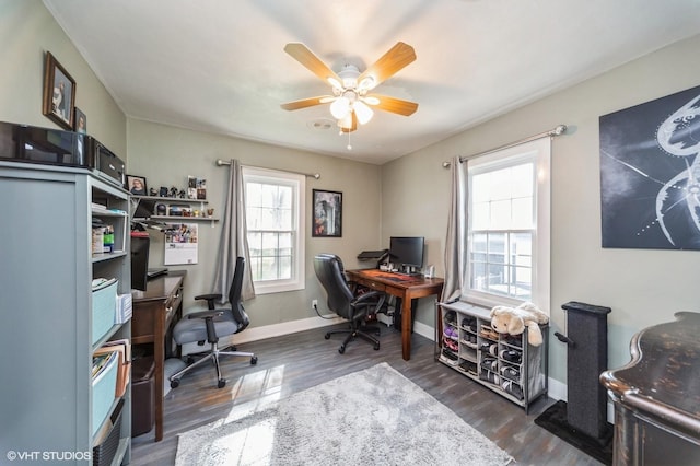1073 66th St, Windsor Heights, IA 50324 - home office with a ceiling fan, baseboards, and dark wood-style floors