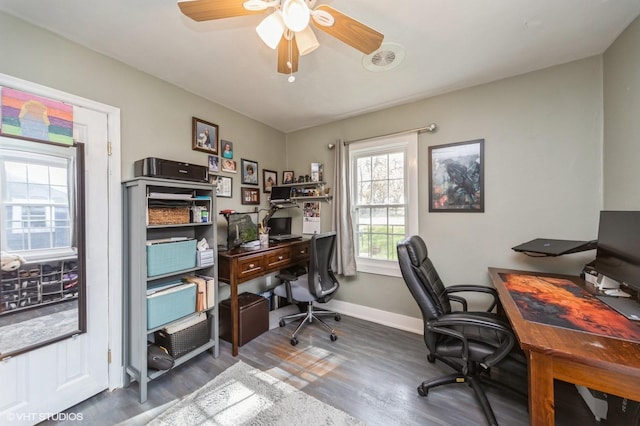 1073 66th St, Windsor Heights, IA 50324 - office with wood finished floors, ceiling fan, and baseboards