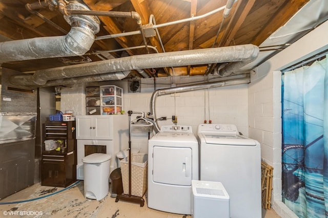 washroom featuring laundry area and washer and dryer