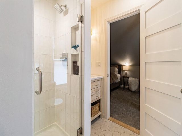 full bath featuring tile patterned floors, ensuite bath, and a shower stall