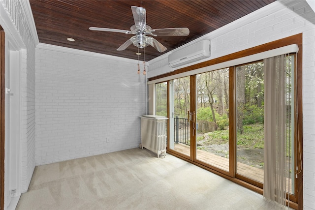 5502 Ingersoll Ave, Des Moines, IA 50312 - unfurnished sunroom featuring a wall mounted air conditioner and a wealth of natural light