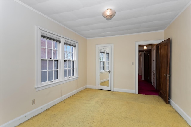 5502 Ingersoll Ave, Des Moines, IA 50312 - carpeted empty room with baseboards and ornamental molding