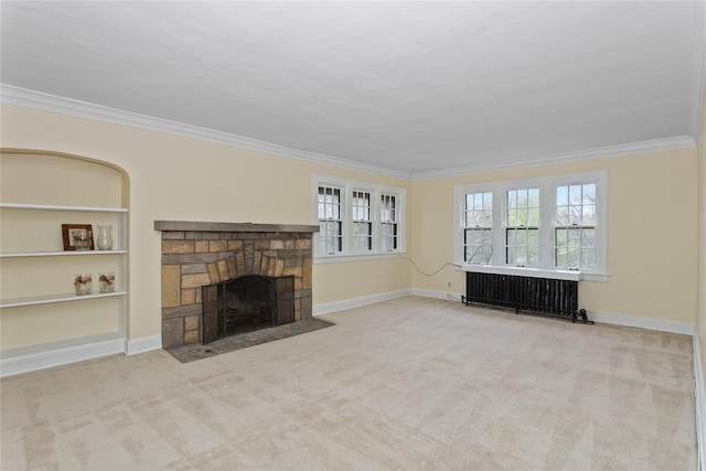 5502 Ingersoll Ave, Des Moines, IA 50312 - unfurnished living room featuring crown molding, baseboards, and a fireplace
