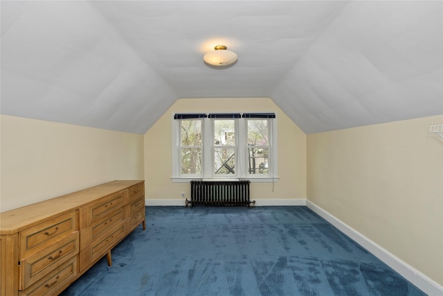 5502 Ingersoll Ave, Des Moines, IA 50312 - bonus room featuring radiator heating unit, baseboards, dark carpet, and lofted ceiling