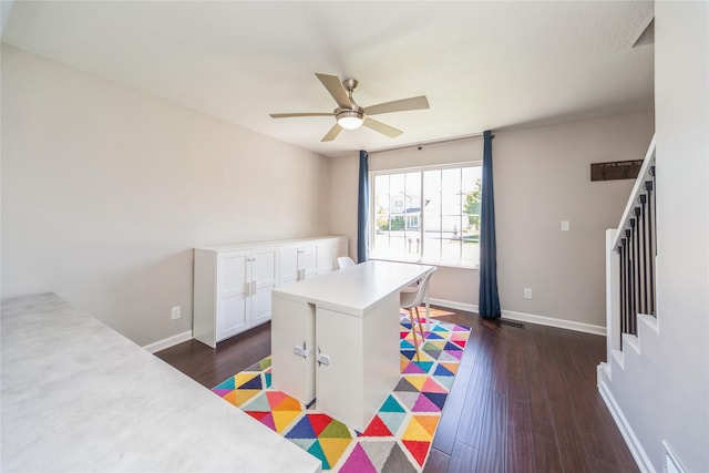 1009 SE 5th St, Grimes, IA 50111 - recreation room with ceiling fan, dark wood-style flooring, and baseboards