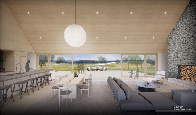 interior space featuring recessed lighting, high vaulted ceiling, wooden ceiling, and a fireplace