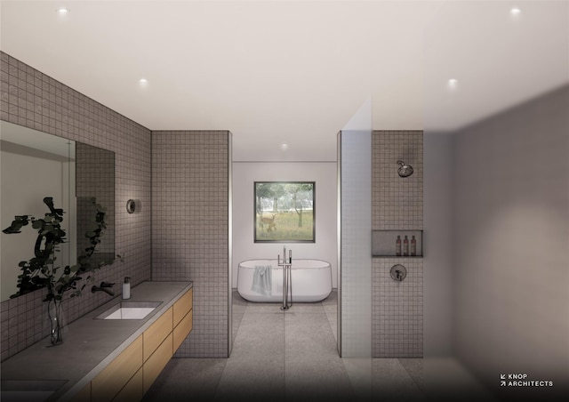 bathroom with a freestanding tub, vanity, tiled shower, and tile walls