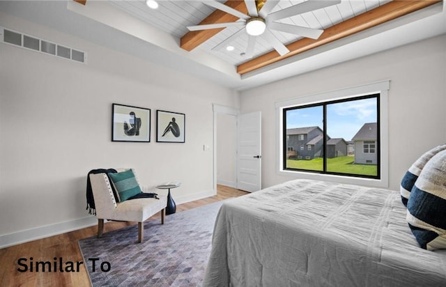 355 NW Red Oak Dr, Waukee, IA 50263 - bedroom featuring wood ceiling, beam ceiling, wood finished floors, baseboards, and recessed lighting