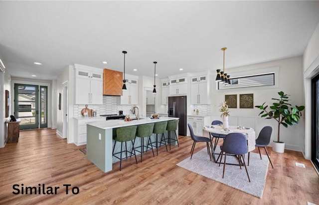 355 NW Red Oak Dr, Waukee, IA 50263 - interior space with recessed lighting, light wood finished floors, baseboards, and a chandelier