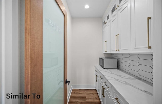 355 NW Red Oak Dr, Waukee, IA 50263 - interior space featuring baseboards, recessed lighting, and dark wood-type flooring