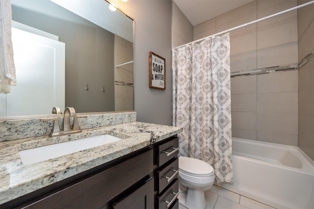 bathroom featuring vanity, tile patterned flooring, toilet, and shower / bath combination with curtain