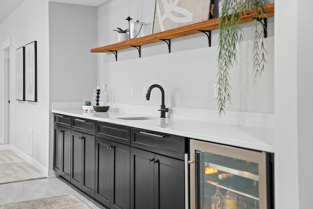 970 Roman Rd, Waukee, IA 50263 - bar featuring baseboards, a sink, and wine cooler