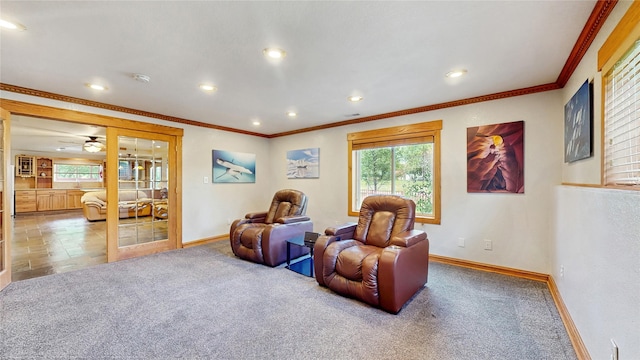 living area featuring carpet flooring, recessed lighting, baseboards, and ornamental molding
