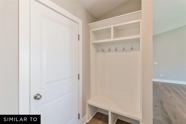 2912 6th Ave SW, Altoona, IA 50009 - mudroom featuring baseboards, wood finished floors, and vaulted ceiling