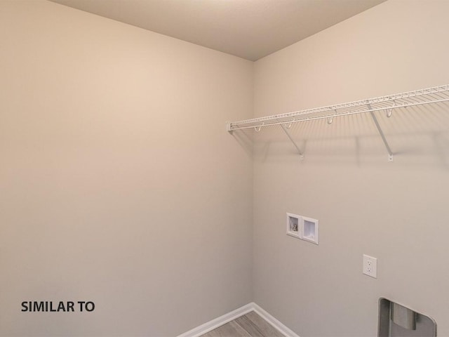 2912 6th Ave SW, Altoona, IA 50009 - laundry area featuring laundry area, baseboards, and washer hookup
