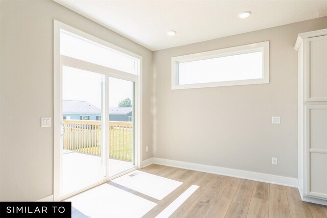 2917 6th Ave SW, Altoona, IA 50009 - spare room featuring recessed lighting, baseboards, and light wood-style flooring
