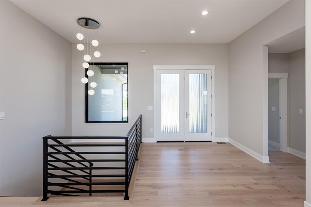 17778 Hammontree Dr, Clive, IA 50325 - entrance foyer with light wood-type flooring, recessed lighting, and baseboards