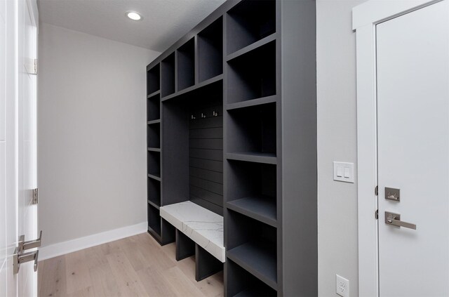 17778 Hammontree Dr, Clive, IA 50325 - mudroom featuring light wood finished floors, baseboards, and recessed lighting