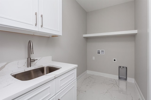 laundry area featuring cabinet space, washer hookup, a sink, marble finish floor, and hookup for an electric dryer