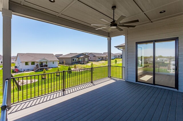 17778 Hammontree Dr, Clive, IA 50325 - wooden terrace featuring a residential view, a ceiling fan, and a yard