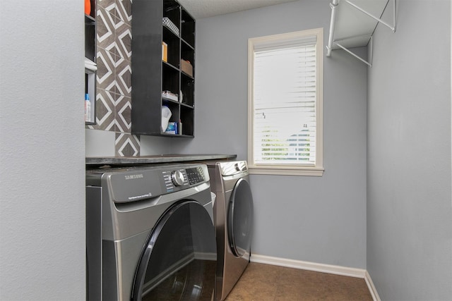 188 Bridgewood Dr, West Des Moines, IA 50266 - clothes washing area featuring washing machine and clothes dryer, laundry area, and baseboards