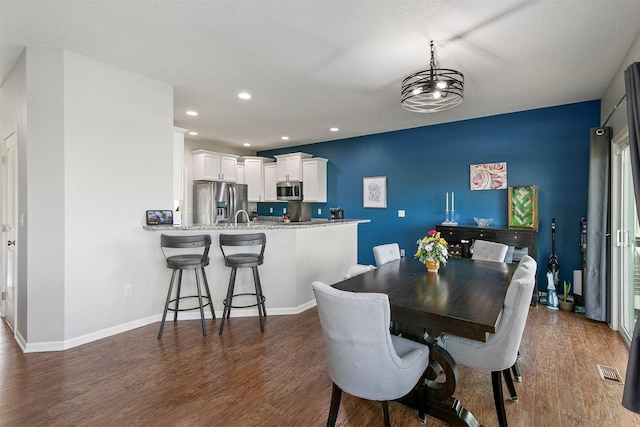 188 Bridgewood Dr, West Des Moines, IA 50266 - dining room with recessed lighting, baseboards, visible vents, and dark wood-style floors
