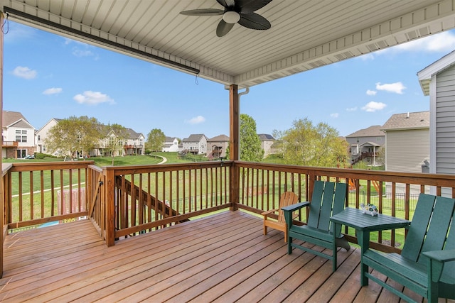 188 Bridgewood Dr, West Des Moines, IA 50266 - deck with a yard, ceiling fan, and a residential view