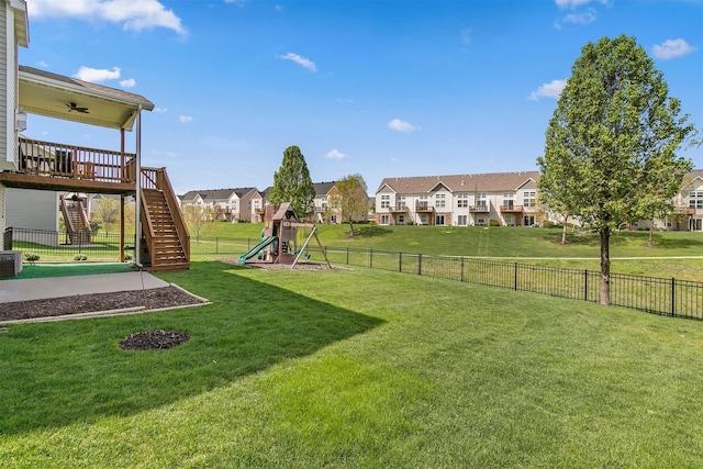 188 Bridgewood Dr, West Des Moines, IA 50266 - view of yard with a fenced backyard, a residential view, a playground, and stairway