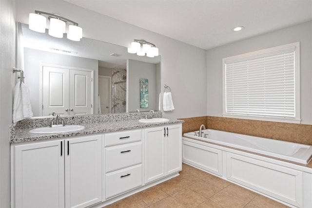188 Bridgewood Dr, West Des Moines, IA 50266 - bathroom with a sink, tile patterned floors, a shower stall, and a bath