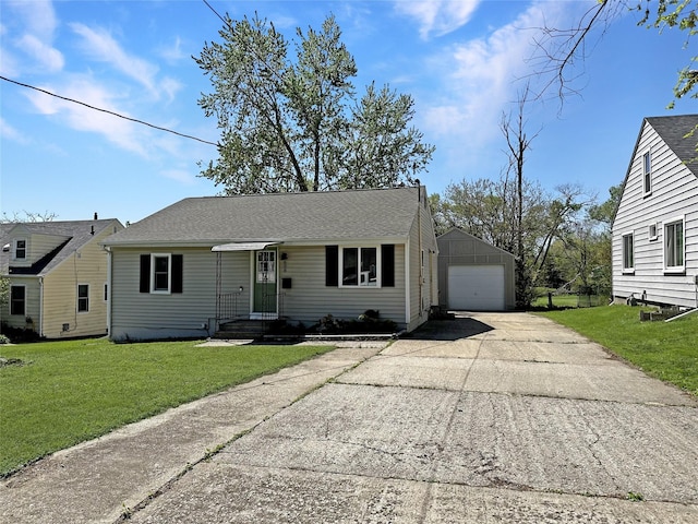 608 12th St, West Des Moines, IA 50265 - single story home featuring concrete driveway, a front lawn, an outbuilding, and a detached garage