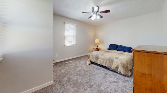 608 12th St, West Des Moines, IA 50265 - carpeted bedroom featuring baseboards and ceiling fan