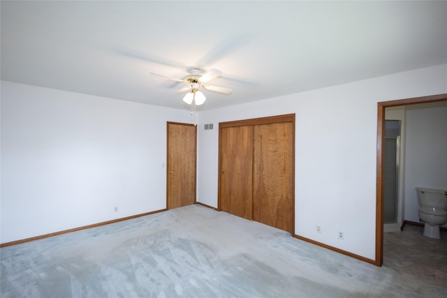 unfurnished bedroom with baseboards, ceiling fan, carpet flooring, and visible vents