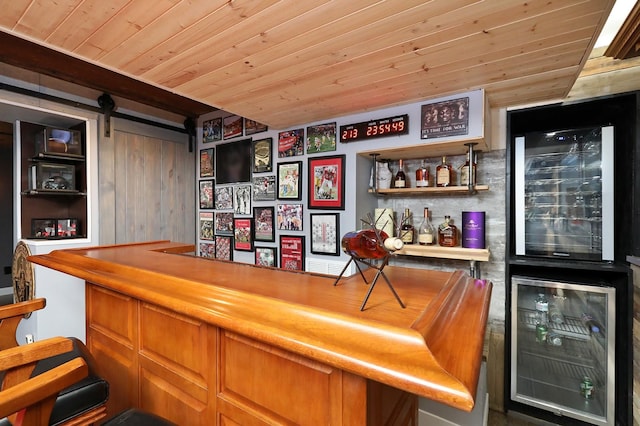 bar with wooden ceiling, a dry bar, and wine cooler