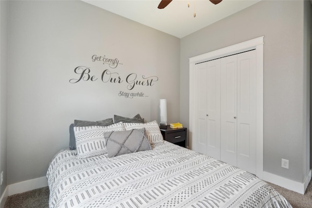 bedroom featuring carpet flooring, baseboards, ceiling fan, and a closet